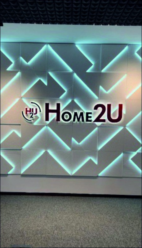 Installation of a luminous volumetric inscription for the company Home 2U in an office&nbsp;