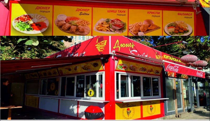 Branding stained glass windows with foil at a doner restaurant.&nbsp;